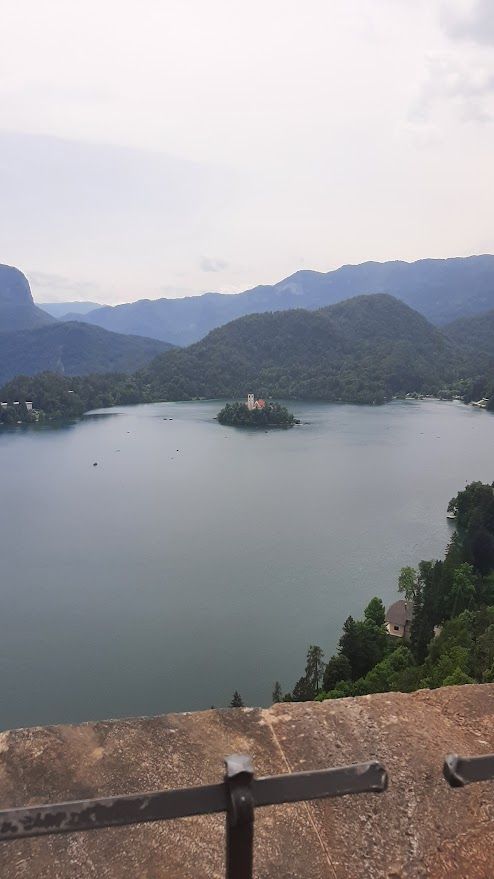 A breathtaking panoramic view from Bled Castle with the lake and Julian Alps stretching below