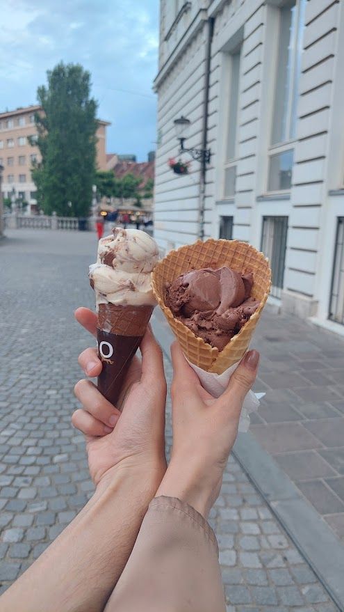 Enjoying a delicious ice cream in the beautiful green streets of Ljubljana Slovenia