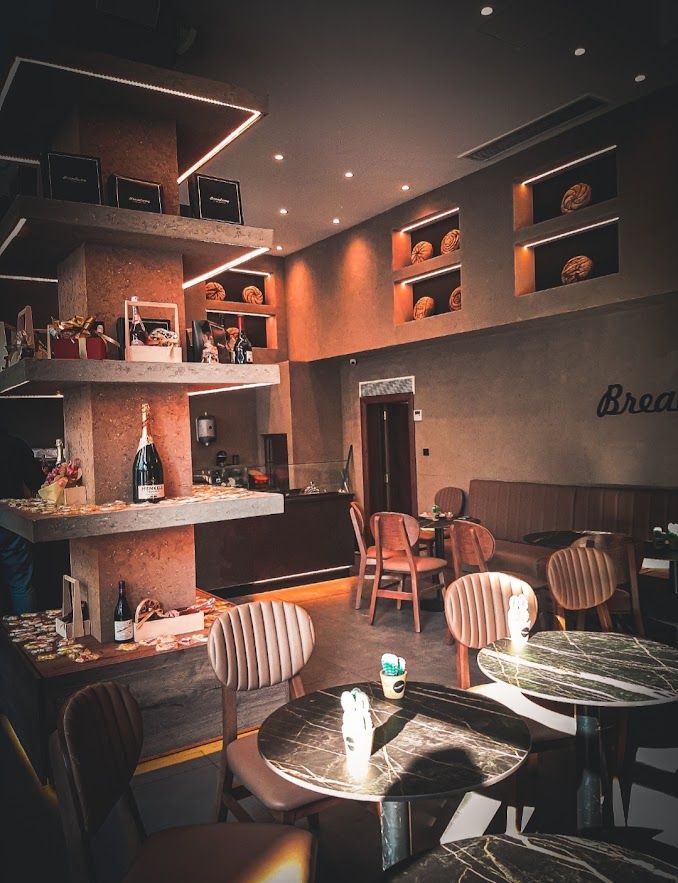 The dreamy French atmosphere at Breadway with soft music and delicate desserts on every table