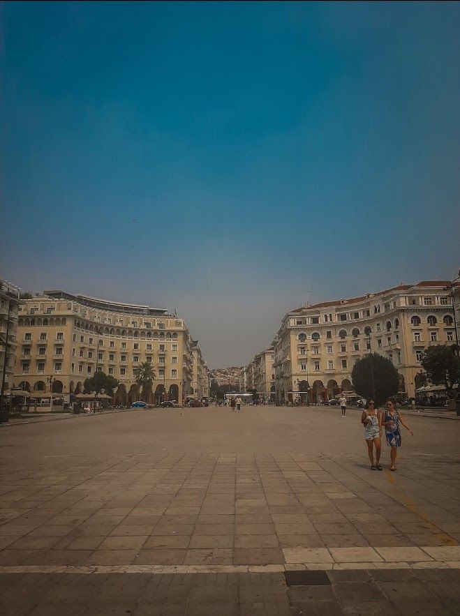 The elegant Aristotelous Square paved with marble tiles and surrounded by neoclassical buildings