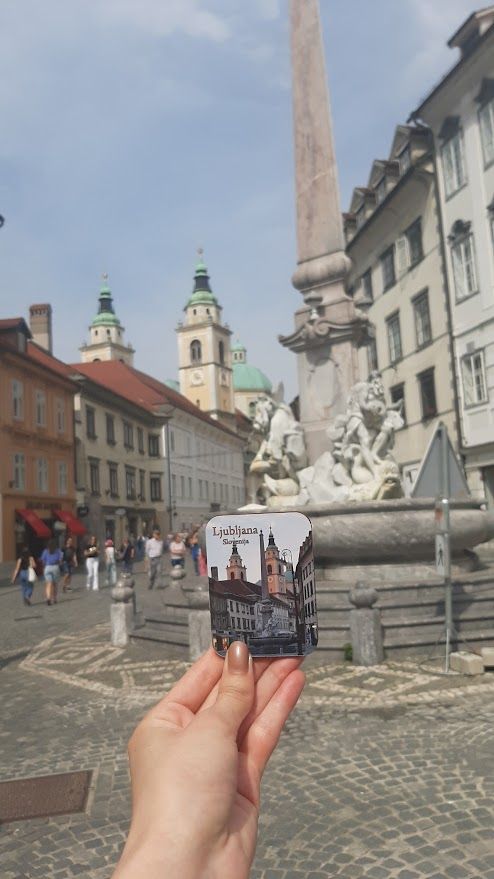 The charming Mestni Square in Ljubljana dressed in Baroque style perfect for tasting Ljubljana coffee