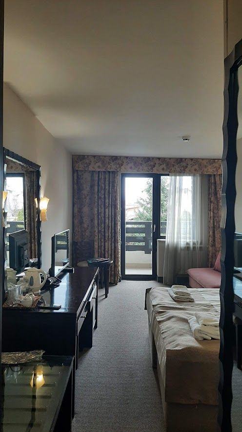 A comfortable warm and clean room at Bansko Hotel and Spa perfect for a cozy winter stay