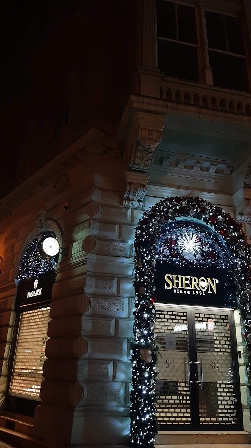 A beautifully lit building in Bratislava at night showcasing the citys ravishing Christmas atmosphere