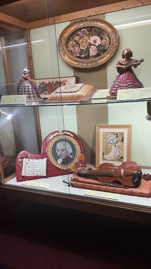 A variety of detailed marzipan artworks showcasing the incredible skill of the museum artists