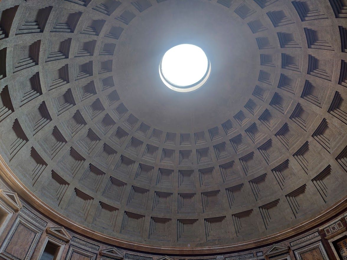 The stunning interior dome of the Pantheon with its oculus bringing natural light to the ancient temple