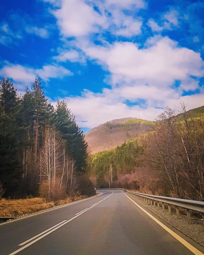 The scenic road trip heading towards Bansko Bulgaria through the mountains