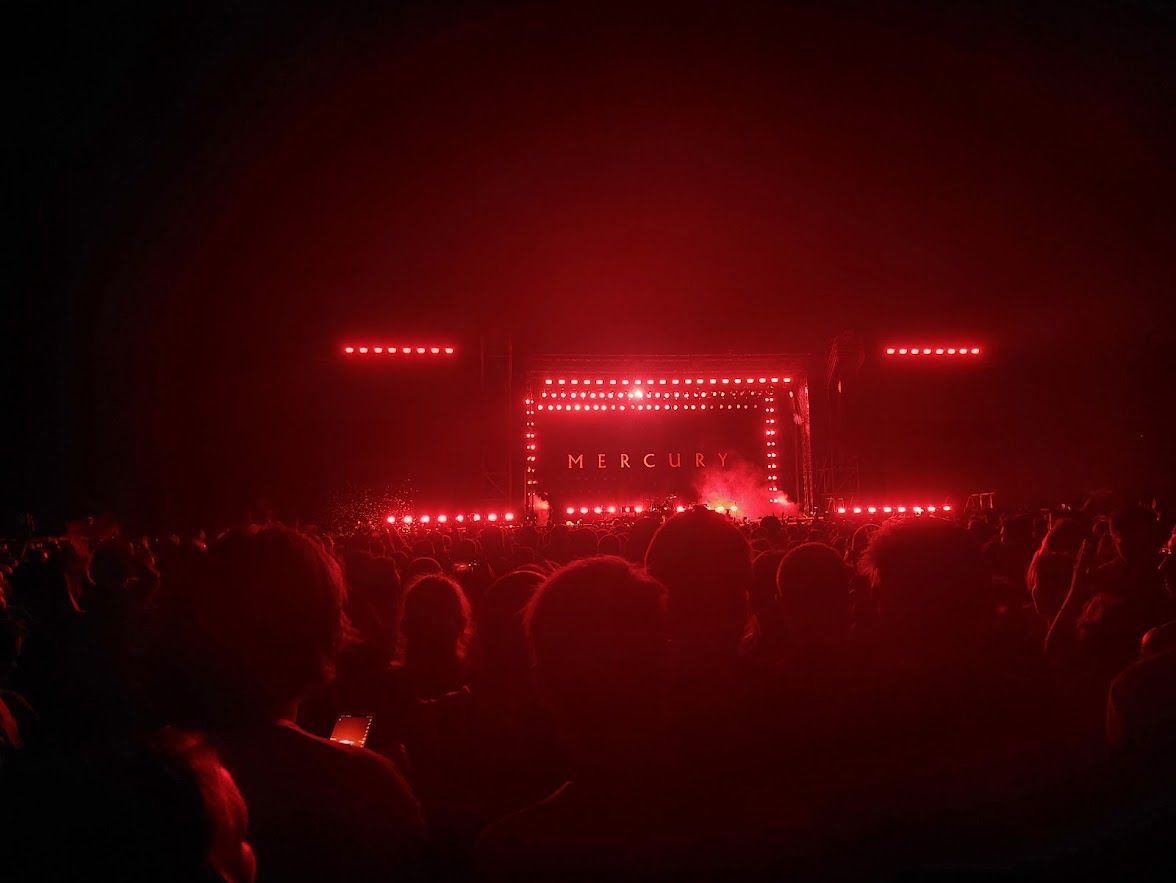 The spectacular Mercury World Tour stage setup with stunning visuals and lighting effects