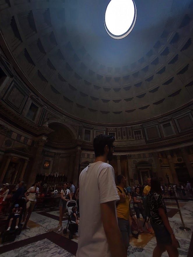 Light streaming through the famous opening at the top of the Pantheon creating a natural magical effect