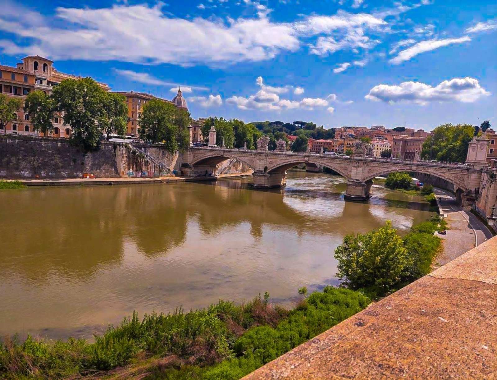 The River Tiber with its beautiful bridges connecting different parts of Rome adding special charm