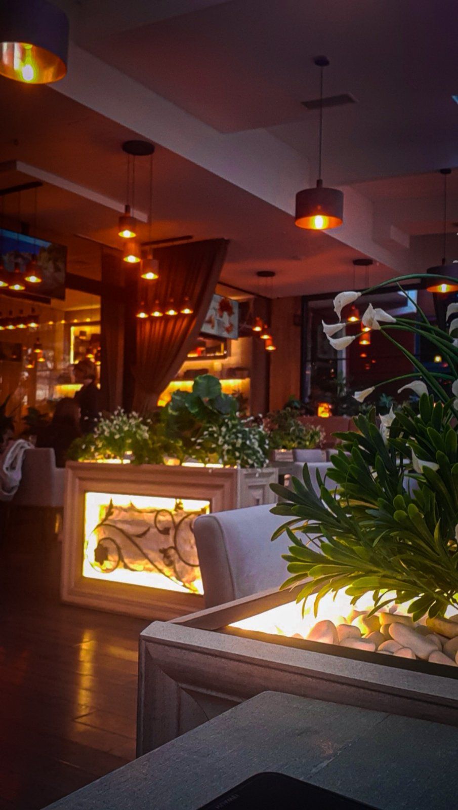 Beautiful flowers filling the opulent interior of Bella Vista restaurant by the Vardar river in Skopje