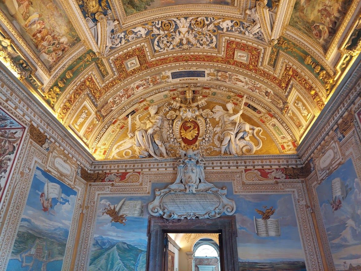 Ancient Roman and Greek sculptures displayed in the grand corridors of the Vatican Museums