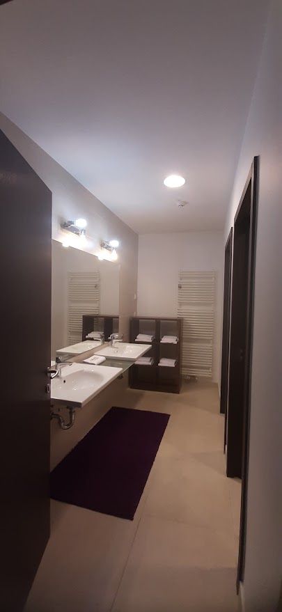 The modern lobby area at Hotel Meksiko Ljubljana with stylish contemporary design