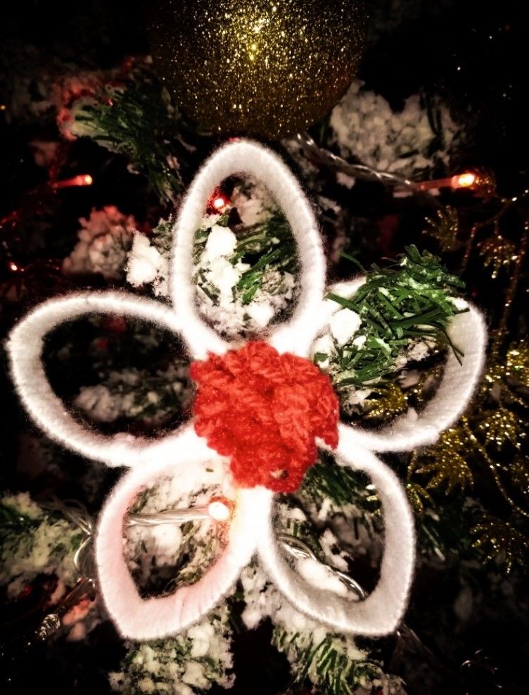 Cute miniature wool socks in different colors used as handmade Christmas tree decorations