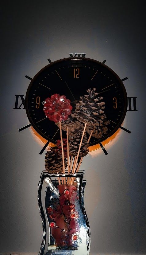 Colorful painted pine cones decorated with zircons arranged in a festive Christmas bouquet