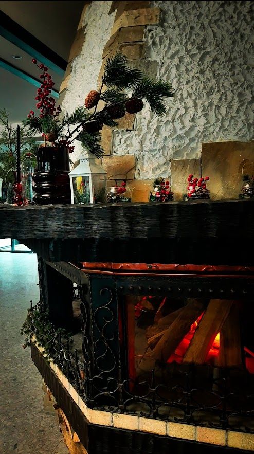 The enchanting lobby of Bansko Hotel filled with coziness beautiful music and delectable drinks