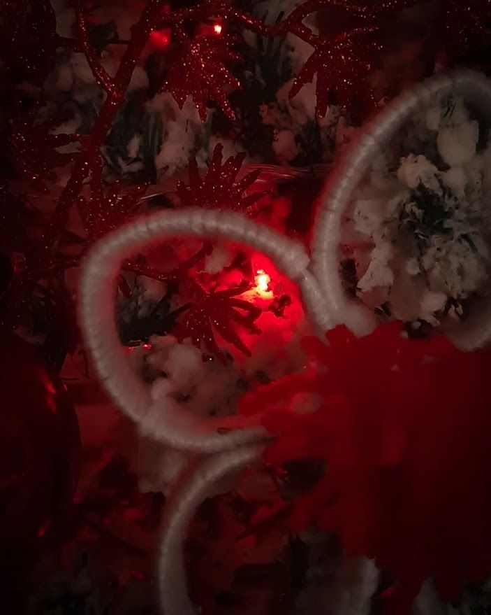A stunning holiday table setting with candles decorations and festive touches for Christmas dinner
