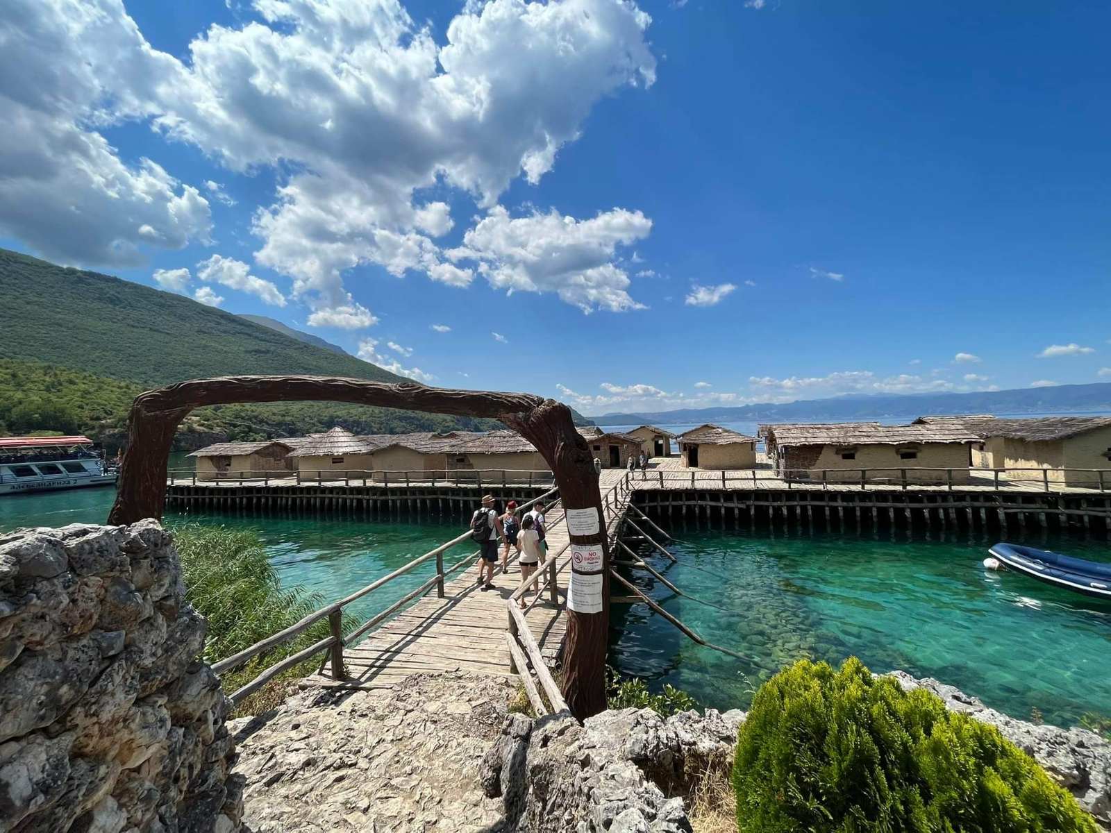 The Bay of Bones open-air museum on water with reconstructed prehistoric wooden houses on stilts over Ohrid Lake