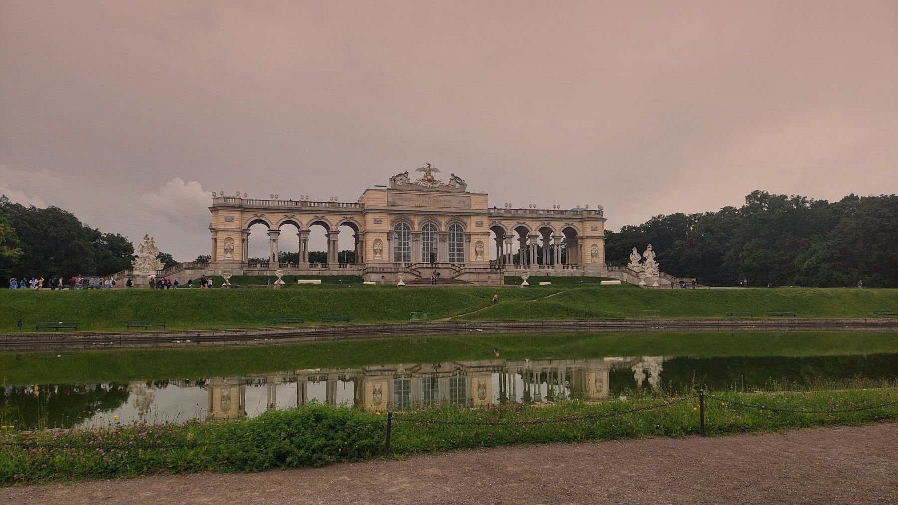 Walking between the tall green hedges of the Schönbrunn maze in Vienna