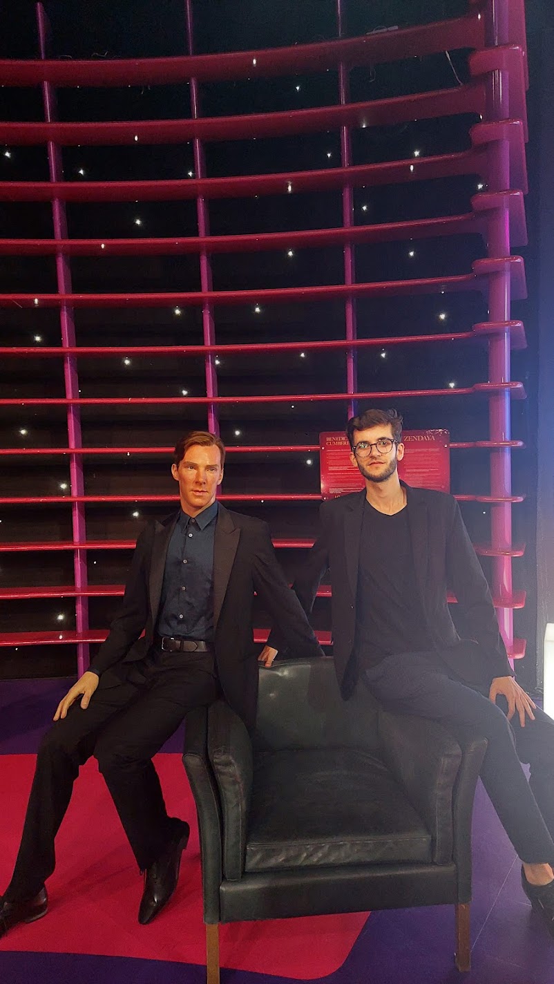 Sitting beside a wax figure of Benedict Cumberbatch at Madame Tussauds in Vienna